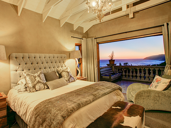 Main bedroom balcony with sunset views.