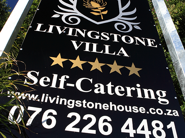 Sign to find the villa from Constantia road
